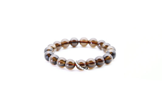 Beaded bracelet with brown and gray beads on a white background